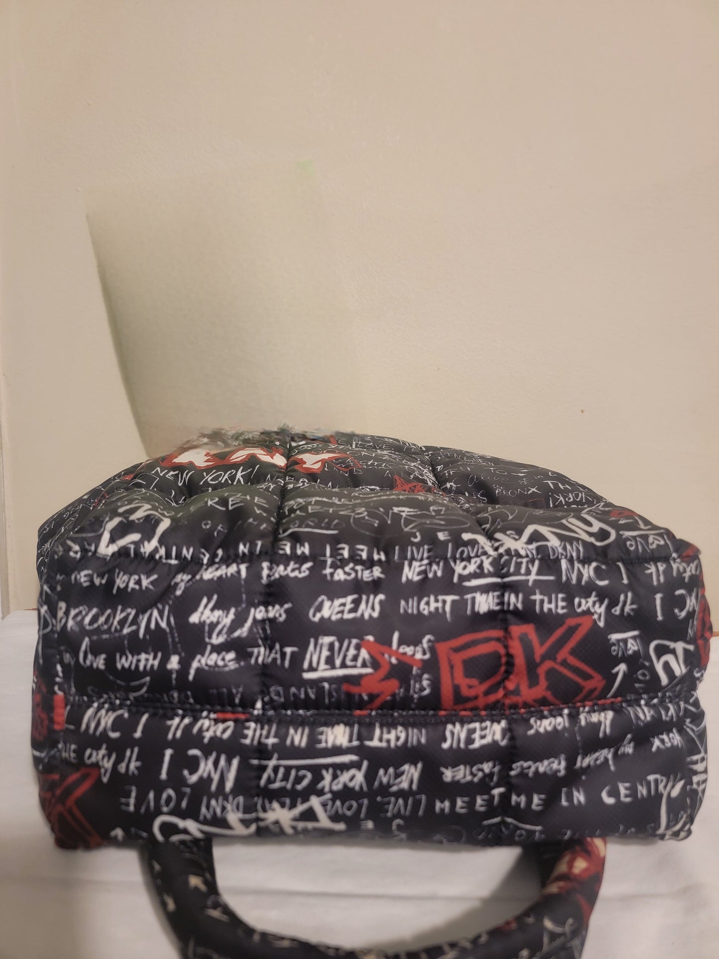 DKNY Giania Graffiti Puffer Tote – Black & Red | Curated Pre‑Owned by REnewd