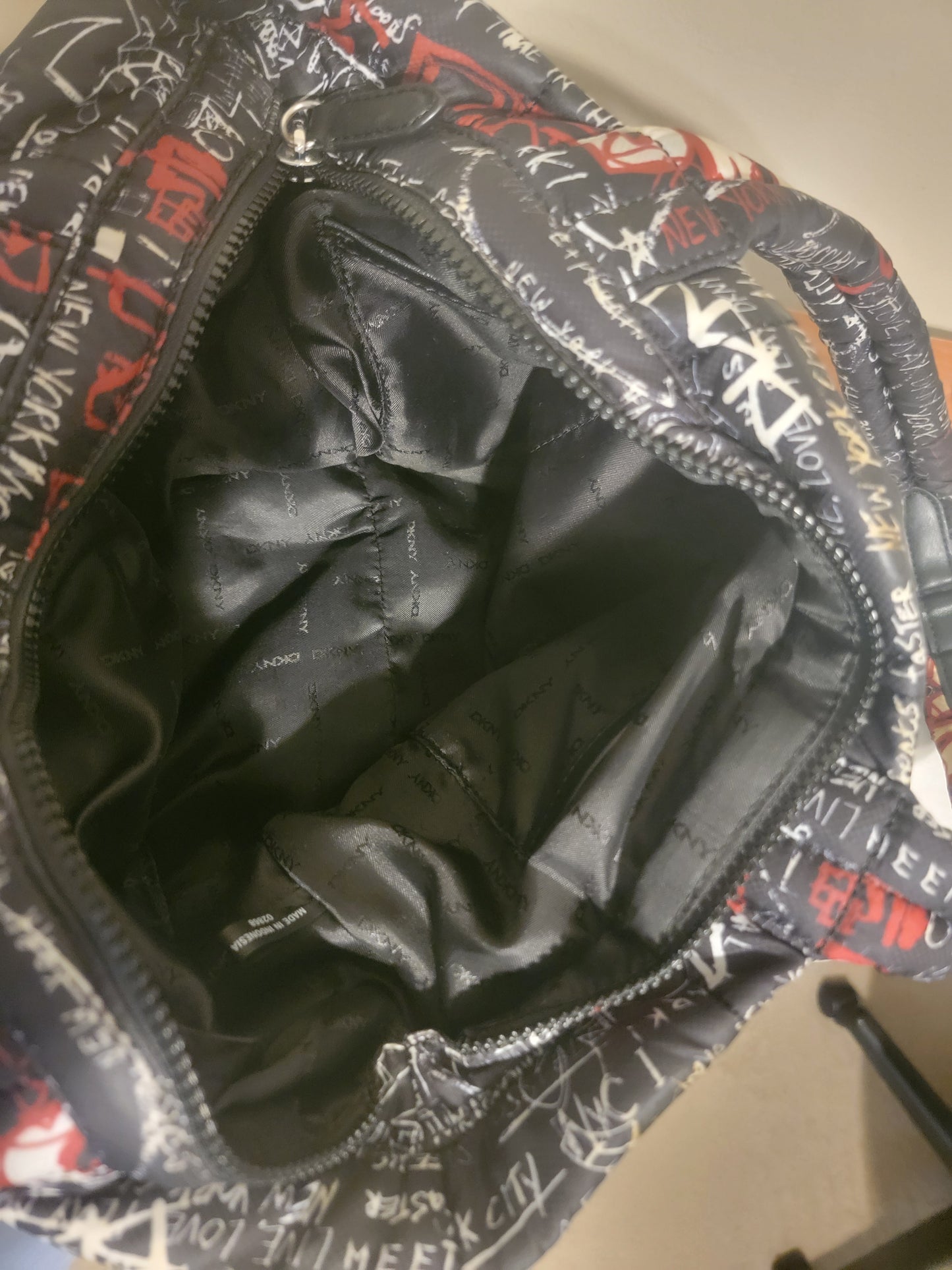 DKNY Giania Graffiti Puffer Tote – Black & Red | Curated Pre‑Owned by REnewd